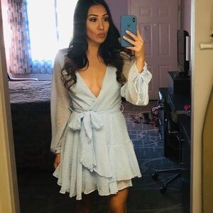 Xenia boutique light blue waist tie dress.